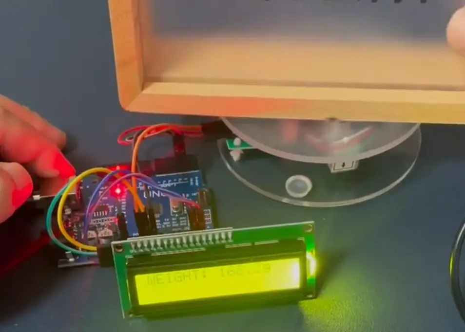HX711 load cell calibration using a known reference weight