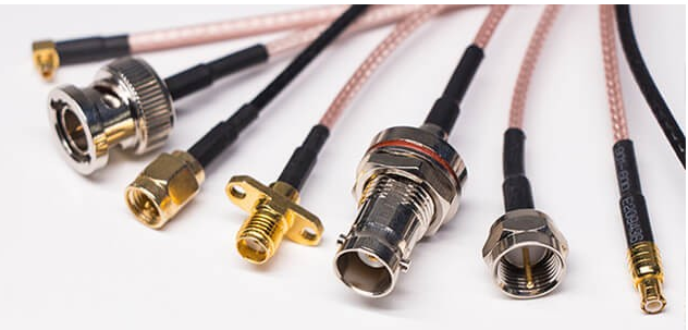 Briefly describe the types of outer packaging materials for electronic harnesses and cables